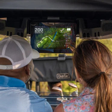 Golfers viewing GPS course graphics on the Club Car Connect display