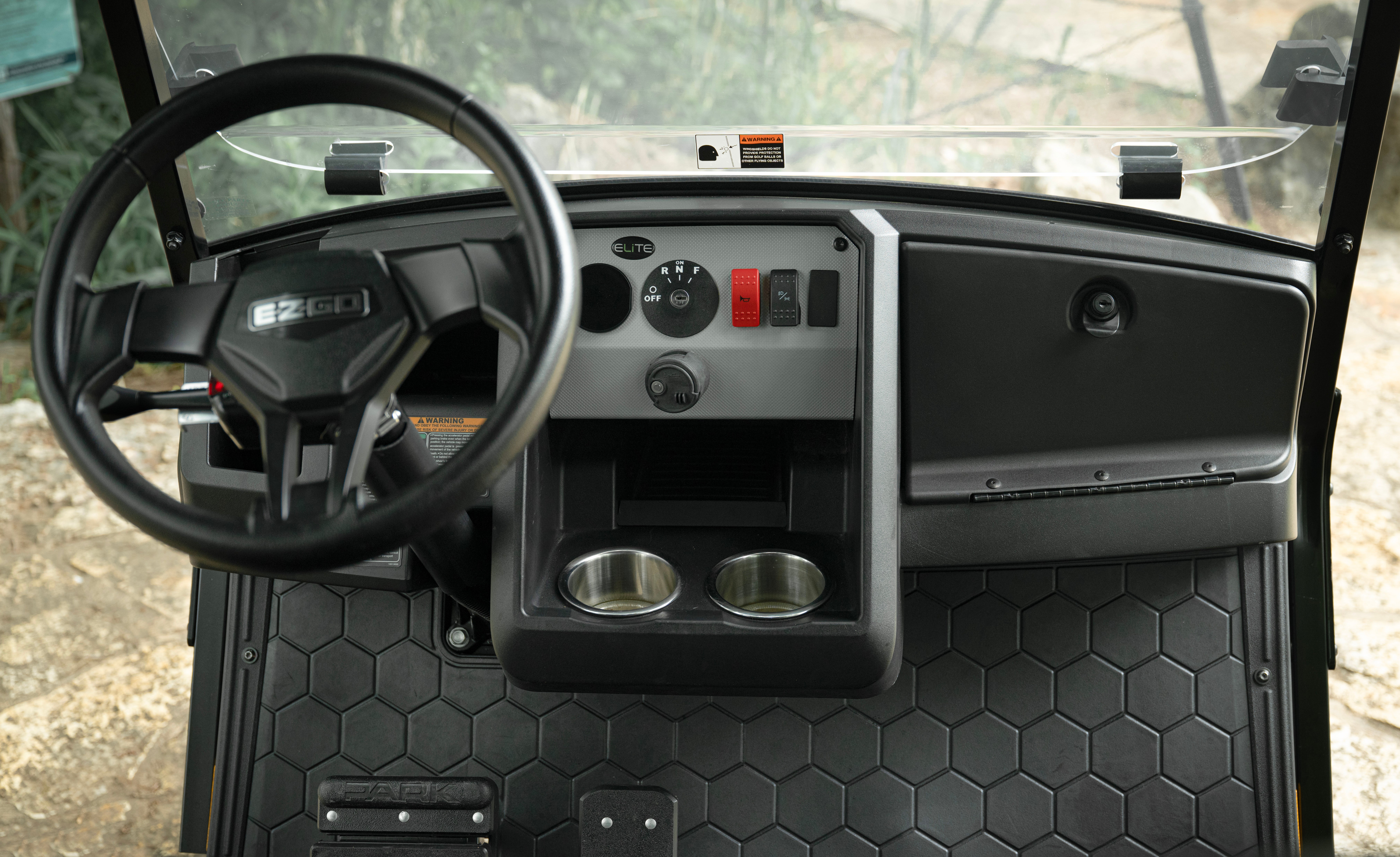 Functional dashboard and storage in an E-Z-GO Express