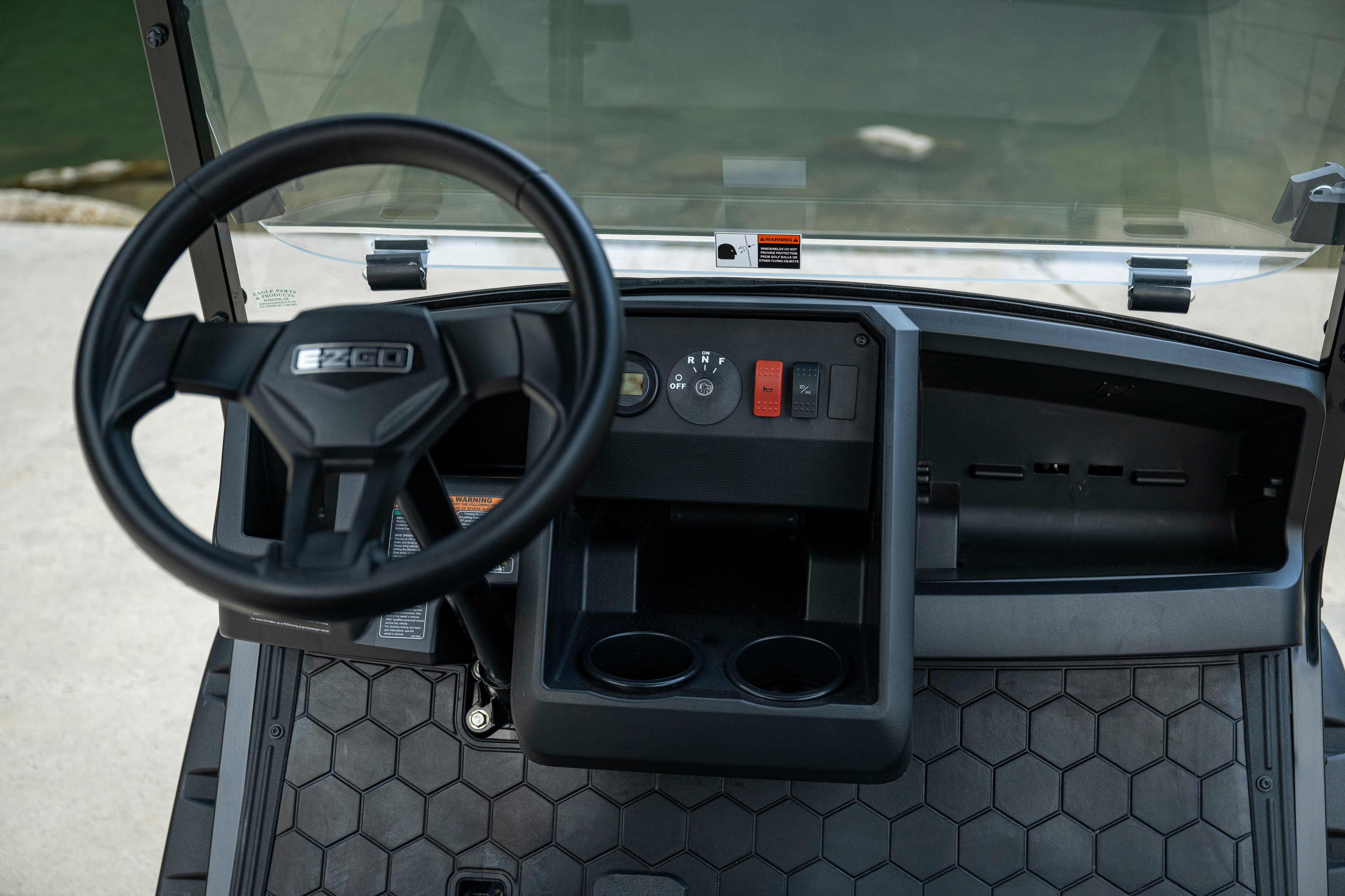 Functional dashboard and storage in an E-Z-GO Express