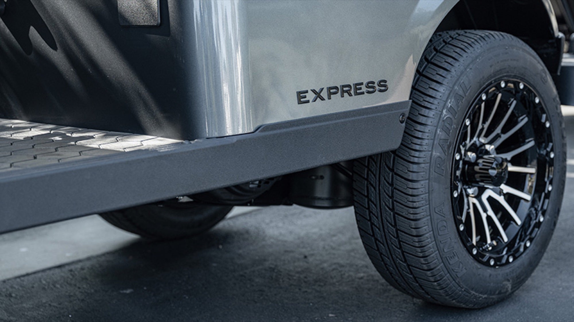 Express badge and wheel detail on the MY2026 E-Z-GO Express 4