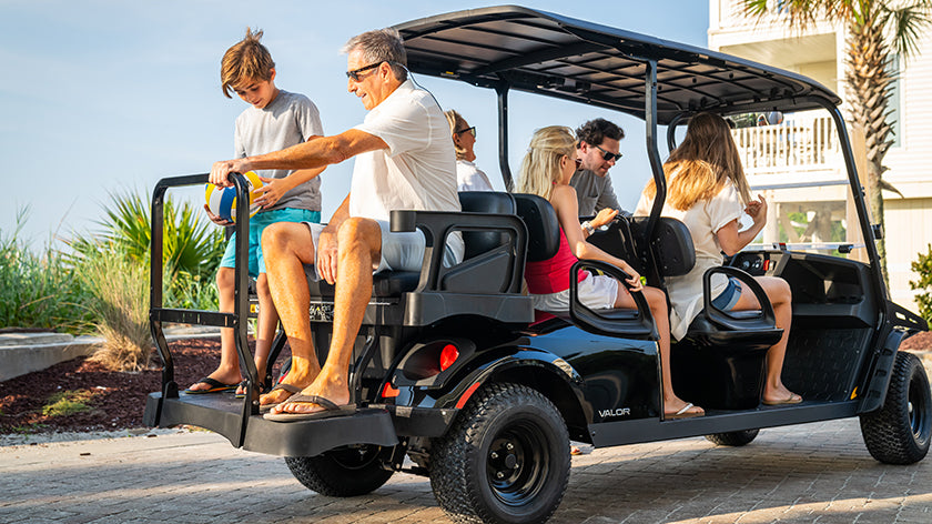 Six passengers riding in an E-Z-GO Valor 6