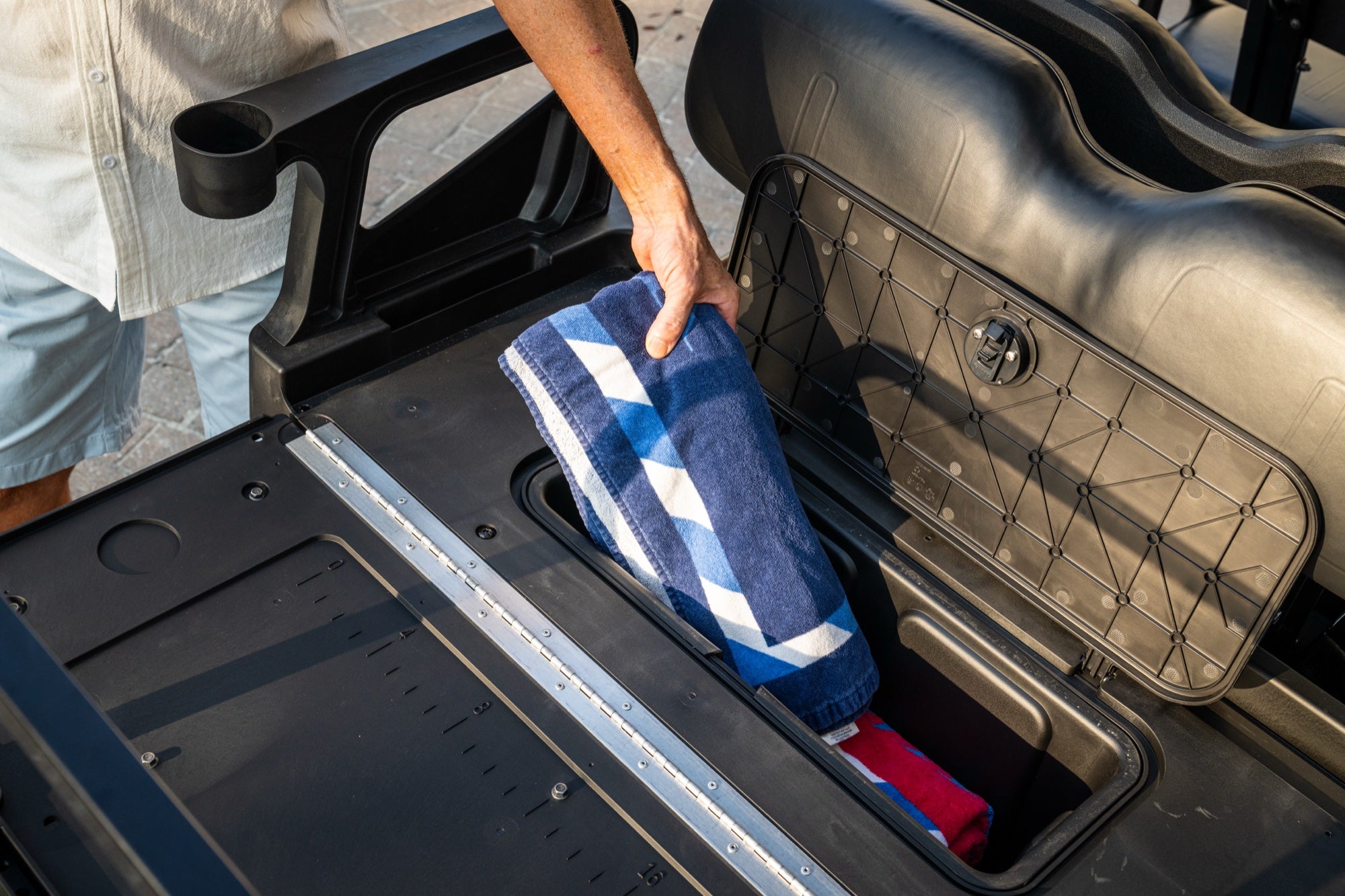 Rear-facing flip seat and drop-in bucket on the E-Z-GO Valor 6